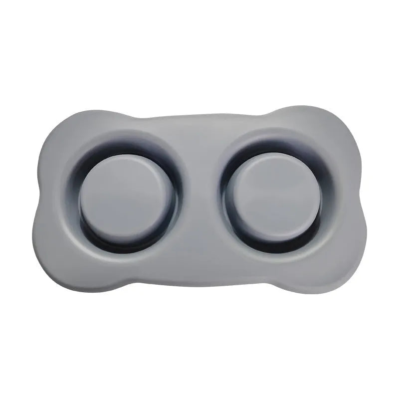 Large silicone dog bowl with stainless steel insert showing double compartment design for food and water separation