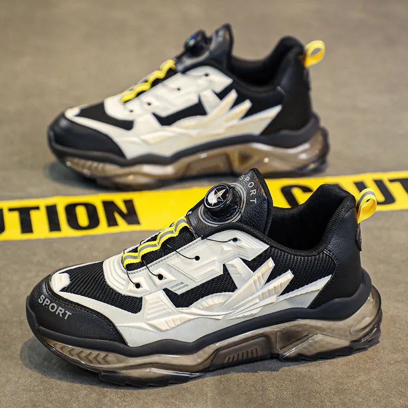 Men's black rotating button casual dad shoes with mesh upper and low platform sole.