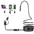 Android phone connected to a USB-C endoscope with flexible cable, hook, magnet, and side mirror accessories.