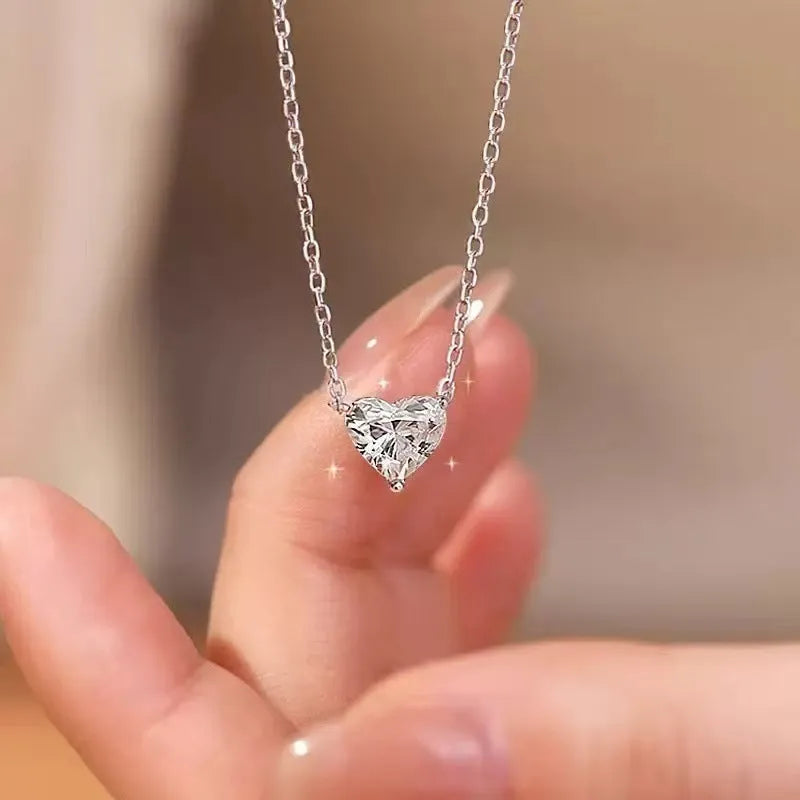 Women's silver heart necklace with simple pendant on chain