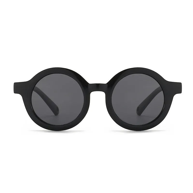 Round frame polarised sunglasses for toddlers aged 0-3 years with UV400 protection, shown in multiple colour options.
