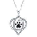 Women's copper necklace with dog and cat paw print pendant on cross chain