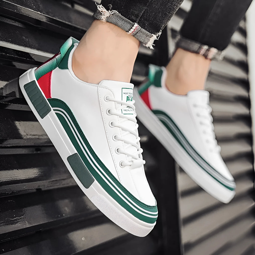 Men's beige and white and green canvas casual shoes with mesh sections and a round toe.