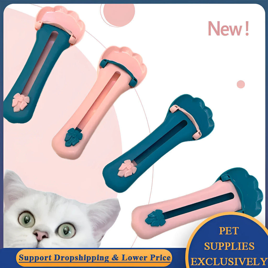 Plastic pet food squeezer dispenser in pink and green colours for feeding cats and puppies.