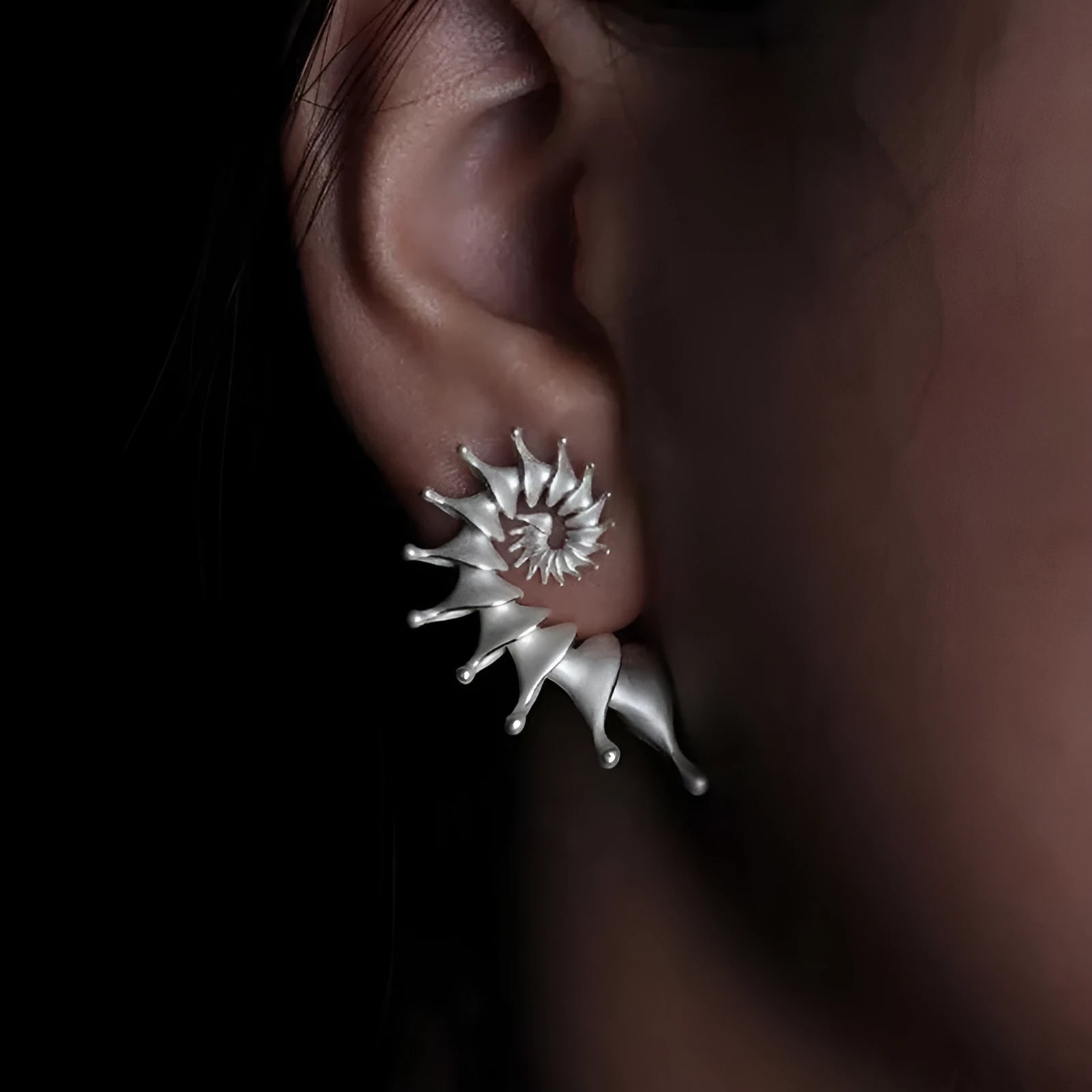 Exaggerated three-dimensional conch matte finish stud earrings with irregular shape