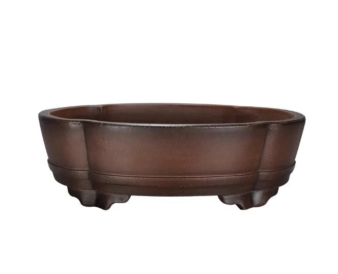 Traditional purple clay flower pot with classical styling for plants and bonsai