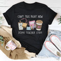 Black cotton summer T-shirt with round neck and short sleeves showing loose straight cut styling
