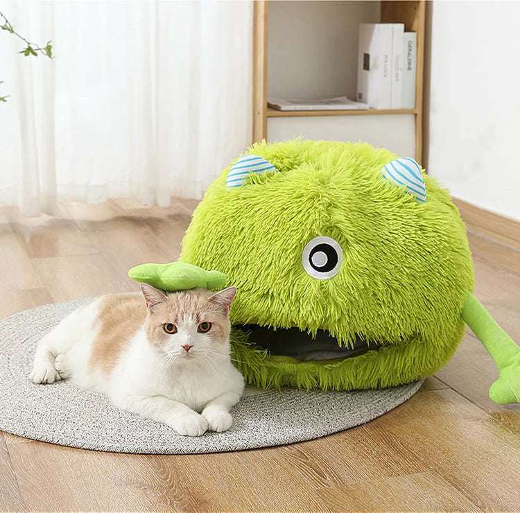 Round fluffy cat bed with soft plush surface and non-slip base