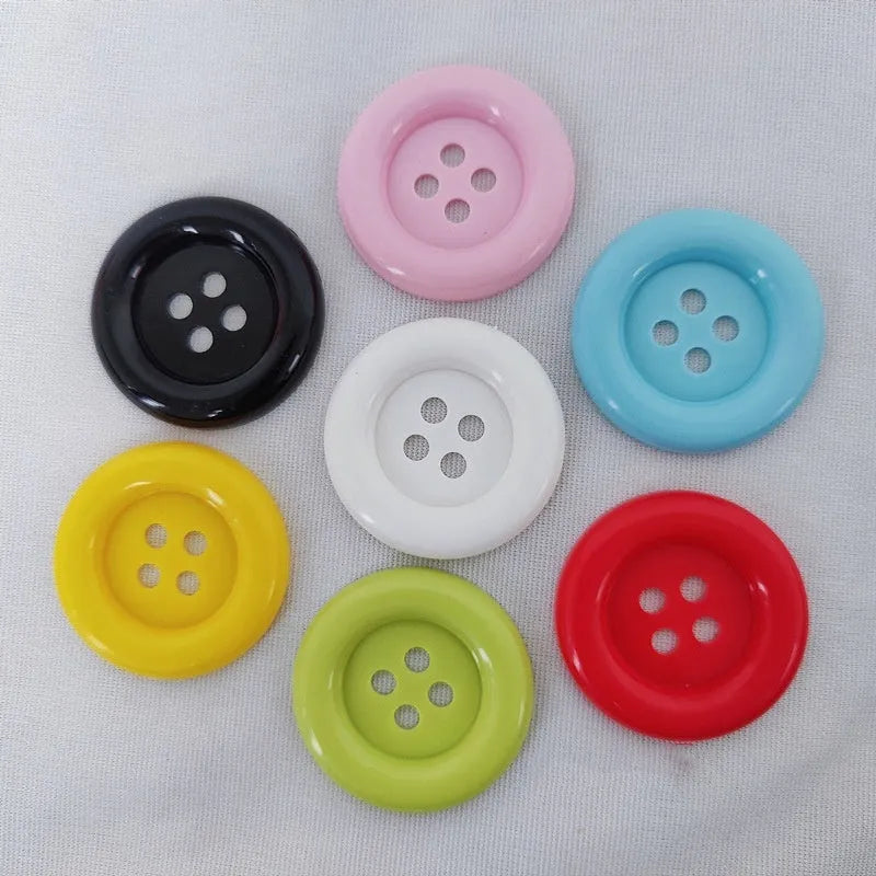 Oversized round plastic nylon button with four holes in 38mm size white colour