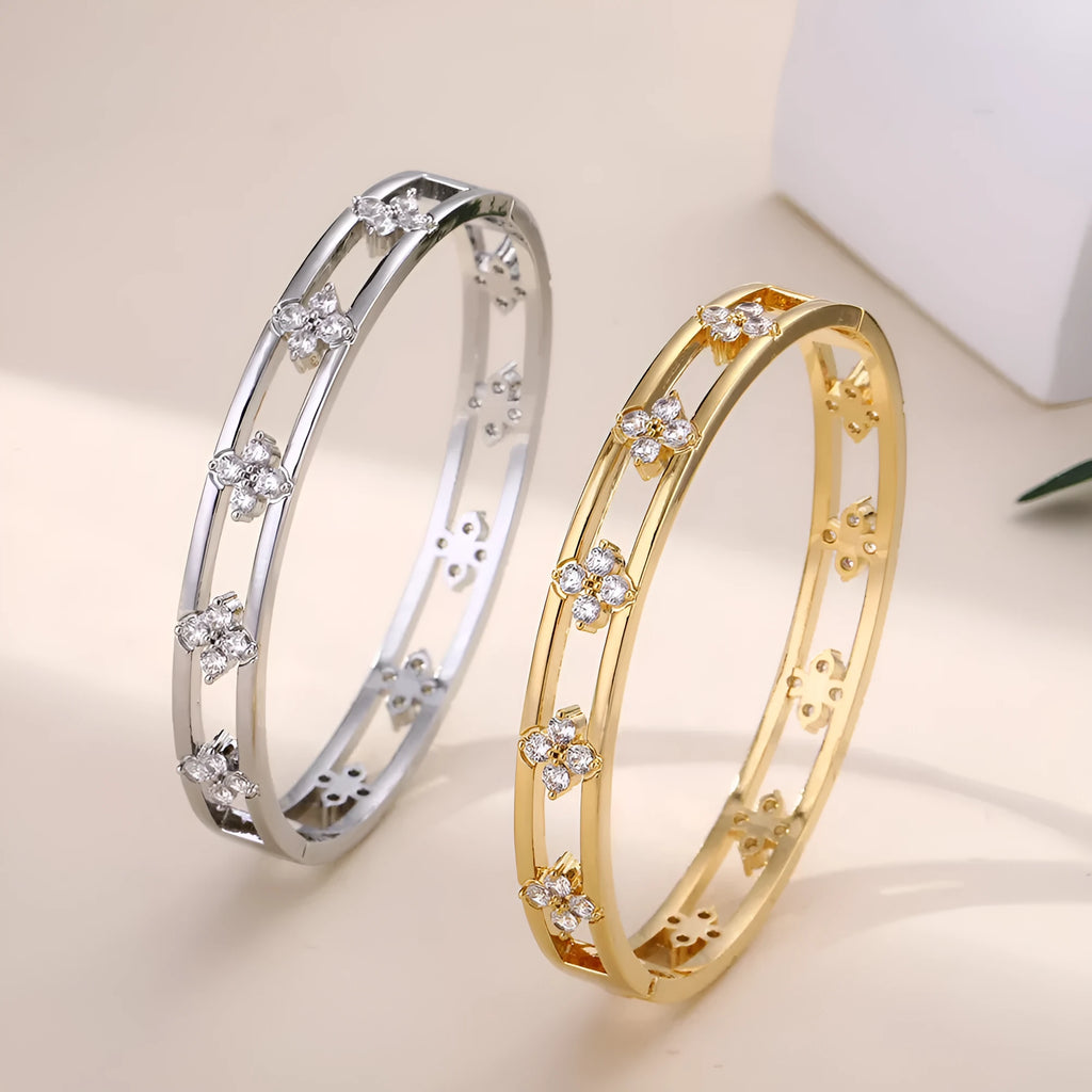 Women's hollow bracelet with zircon stones and four-leaf clover design