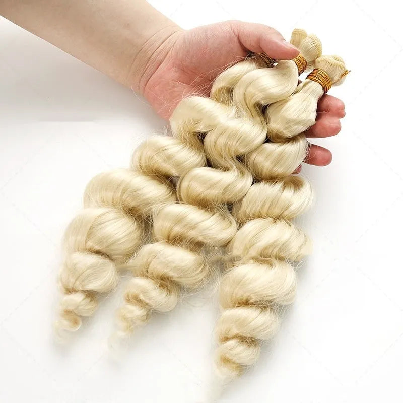 Golden blonde synthetic hair weft wig shown in 18, 20, and 22 inch lengths.