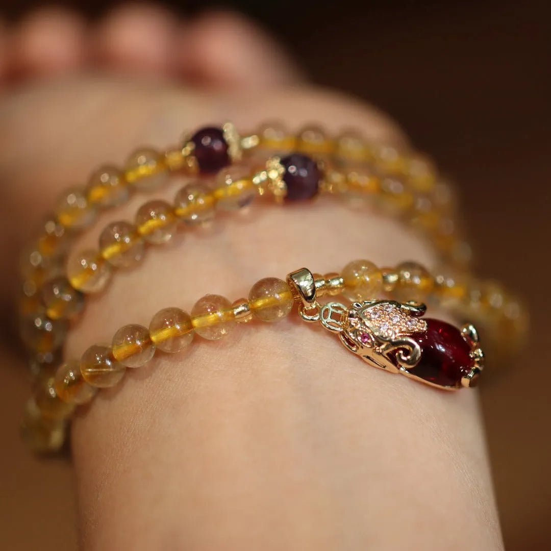 Natural Brazil gold rutilated quartz bracelet with three gold circles and ruby quartz hanging chopsticks charm