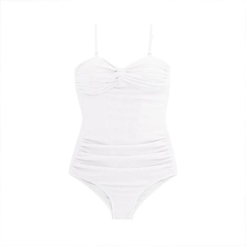Women's solid colour one-piece swimsuit with adjustable suspender straps and a high-waist design.