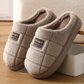 Men's plaid pattern rabbit hair slippers with artificial wool lining and thick EVA sole.