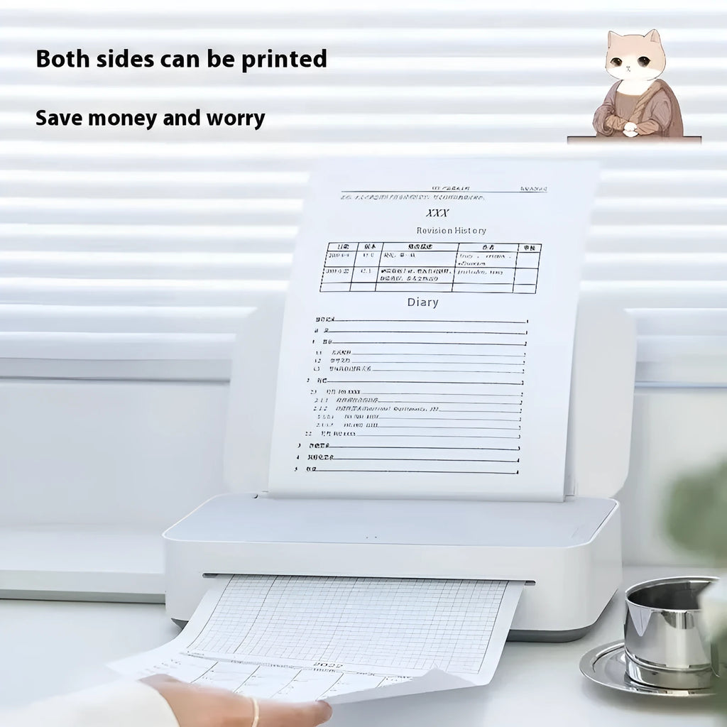 Small white plastic intelligent remote learning printer with a ribbon cartridge on a home desk.