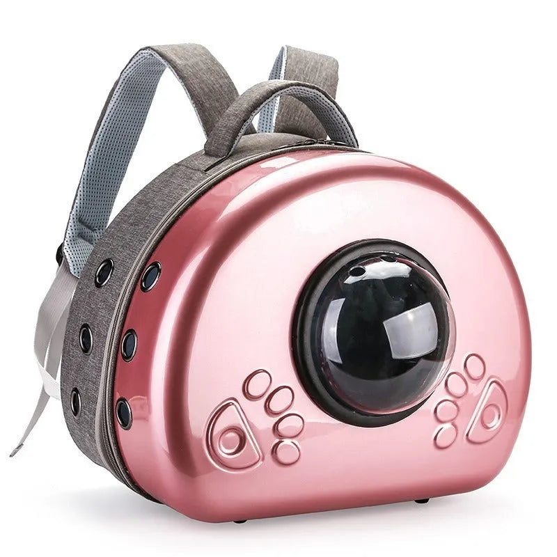 Transparent space capsule-shaped cat carrier bag with a handle in a choice of coloured front covers.
