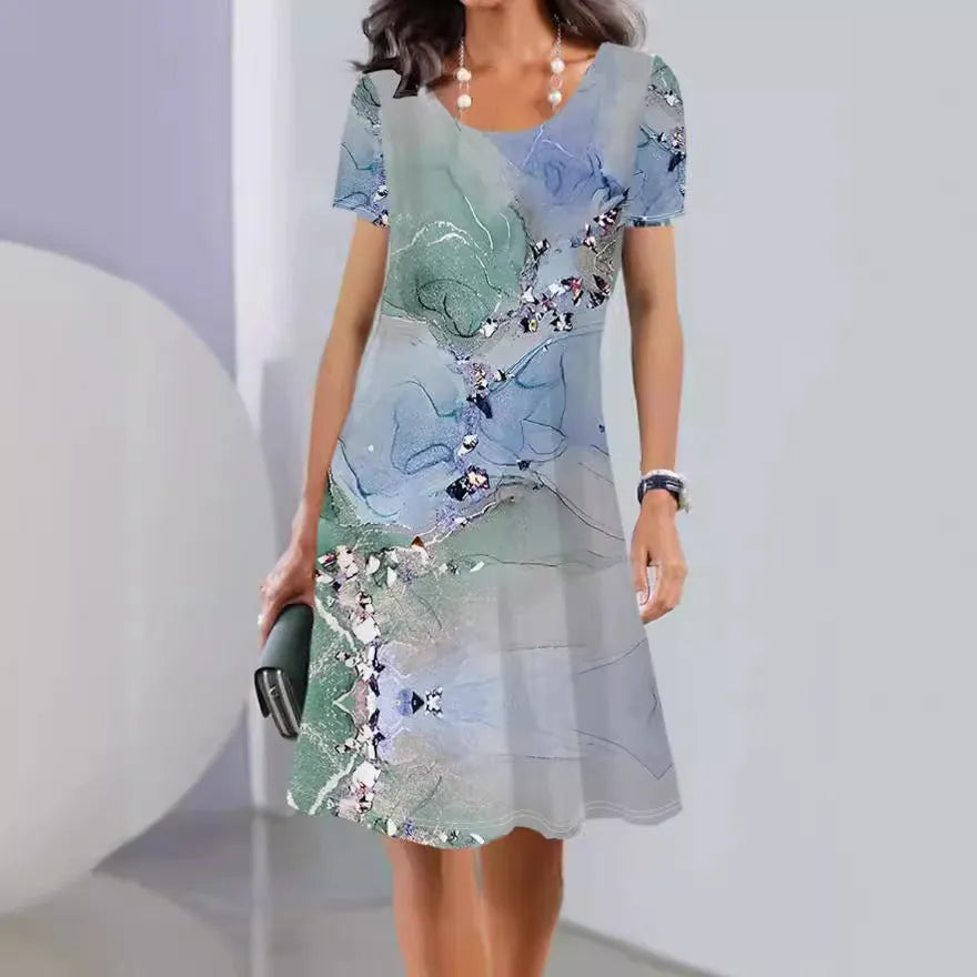 Women's light blue Ice Silk A-line midi dress with painted floral and leaf patterns, short sleeves, and a round neck.