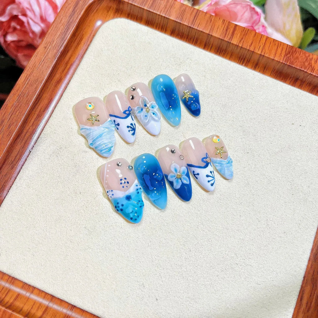 Blue hand-painted carved summer ice transparent fake nails plastic set with sizes XS S M L