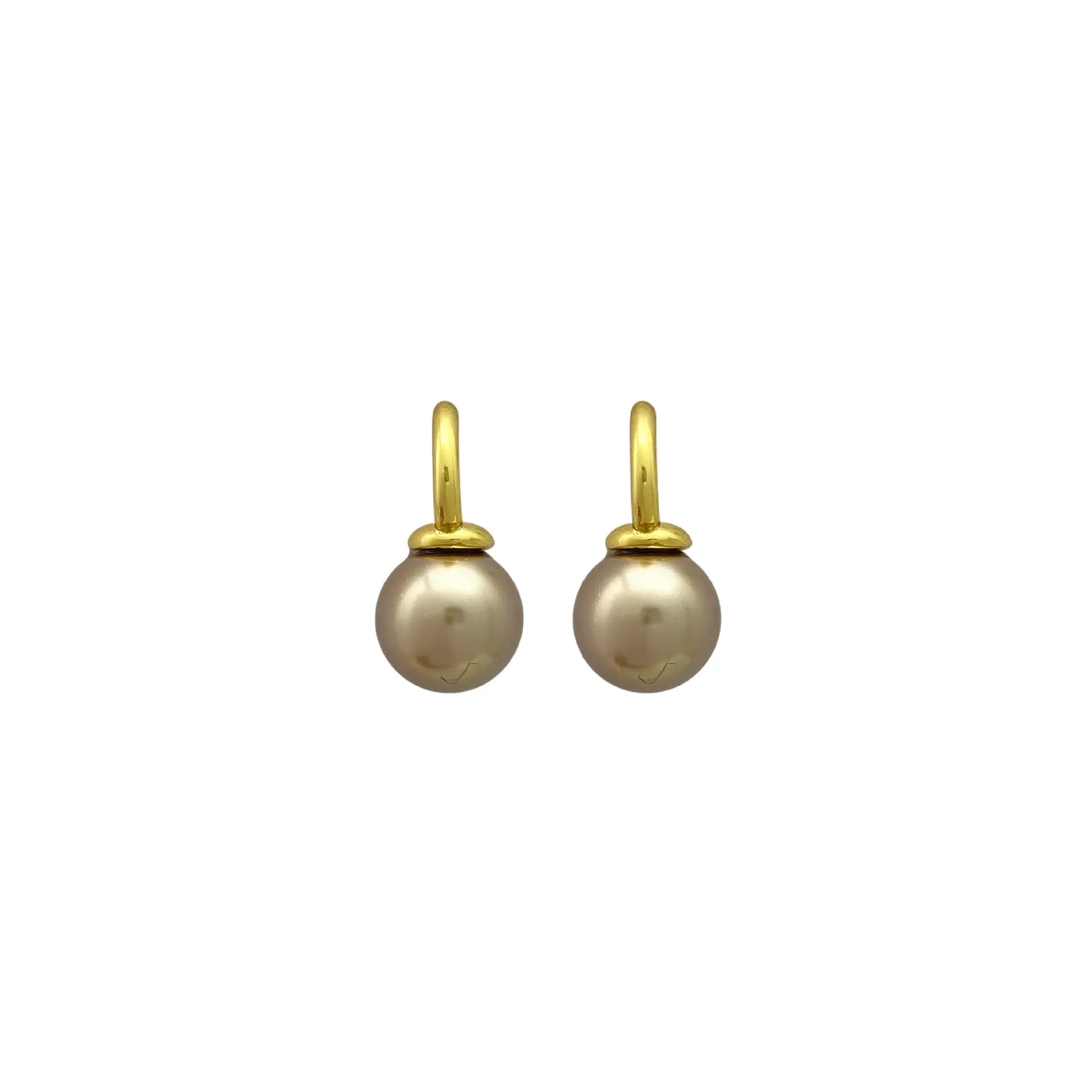 Vintage champagne pearl clip-on earrings with copper electroplated geometric design, on display as a pair