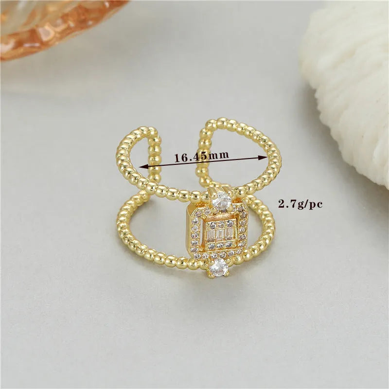 Copper open ring with 14K gold plating, adjustable opening, and asymmetric U-shaped design