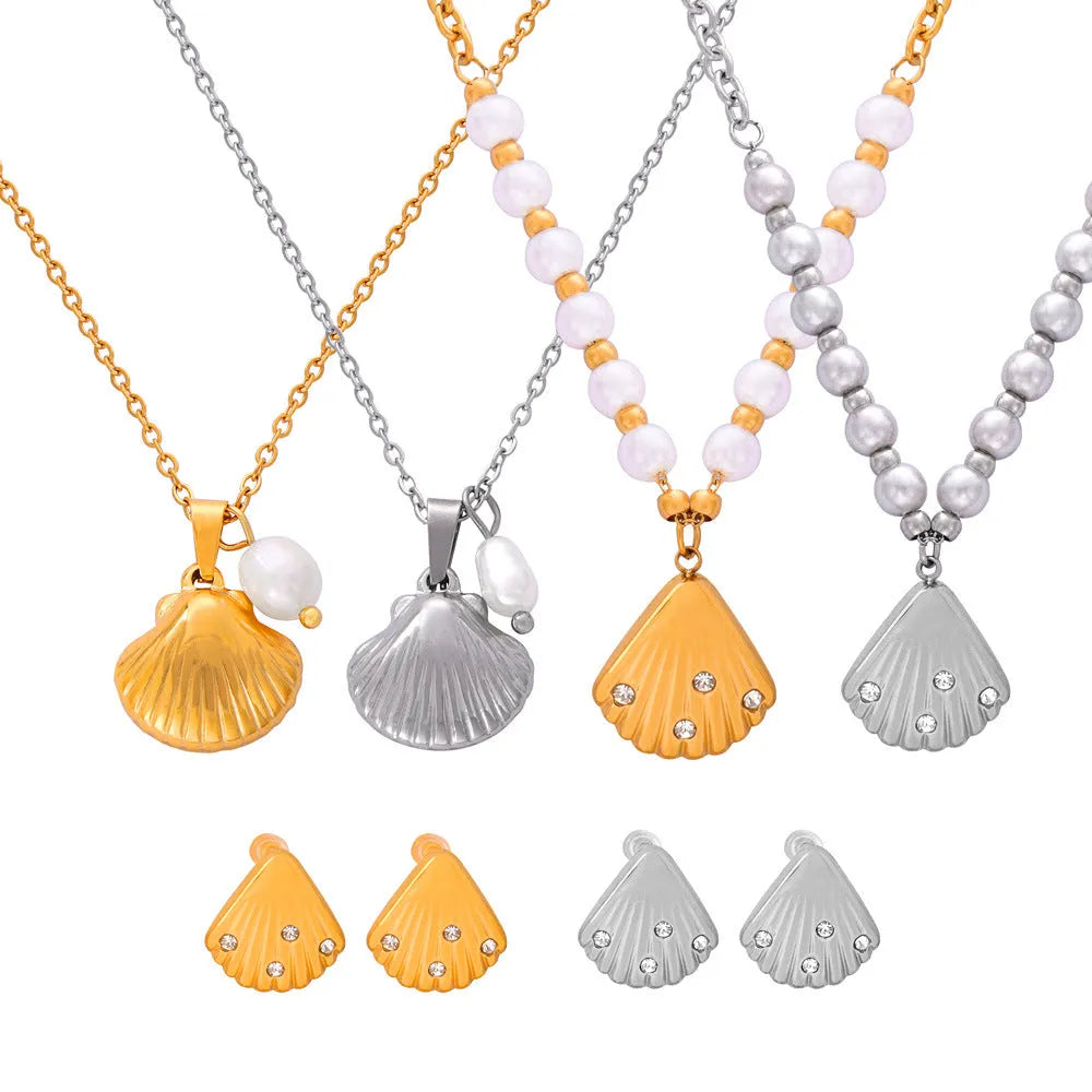 Gold titanium steel necklace with French vintage shell pendant and freshwater pearl beads on O-shaped chain