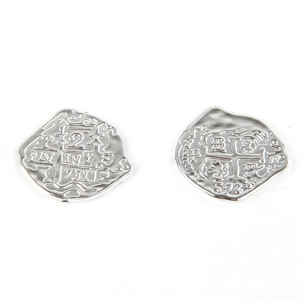 Plastic Roman coins bulk pack showing gold, silver, and bronze antique finishes.