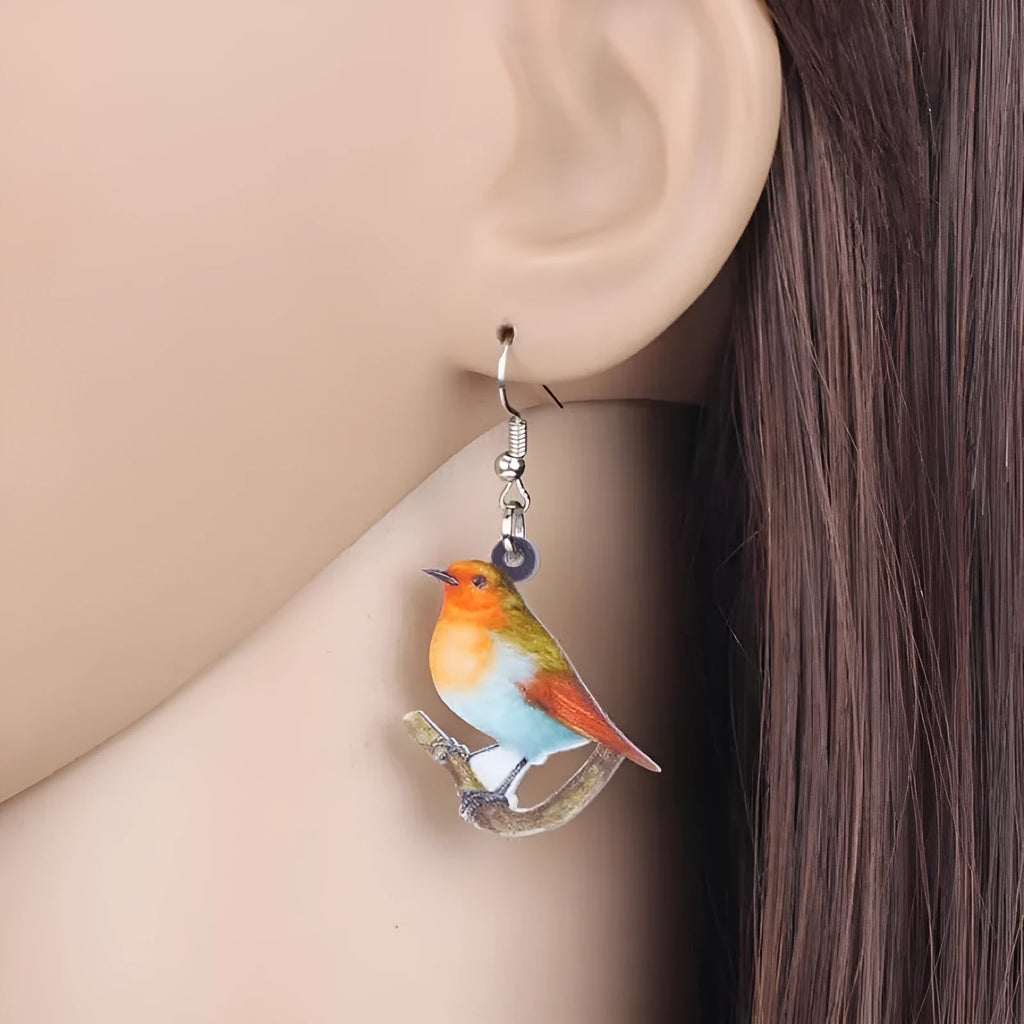Blue titmouse design acrylic pendant earrings with snake pattern and geometric elements