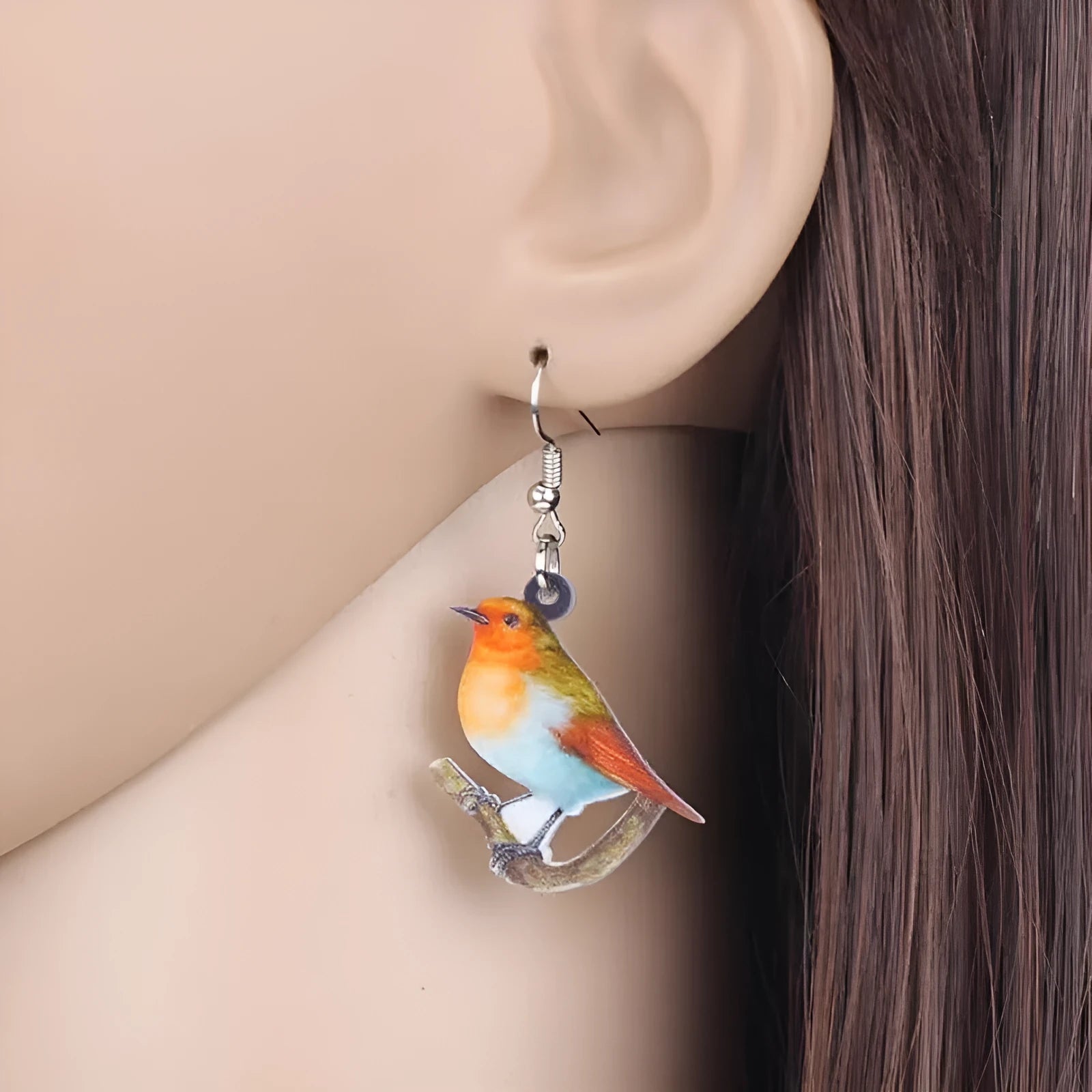 Blue titmouse design acrylic pendant earrings with snake pattern and geometric elements