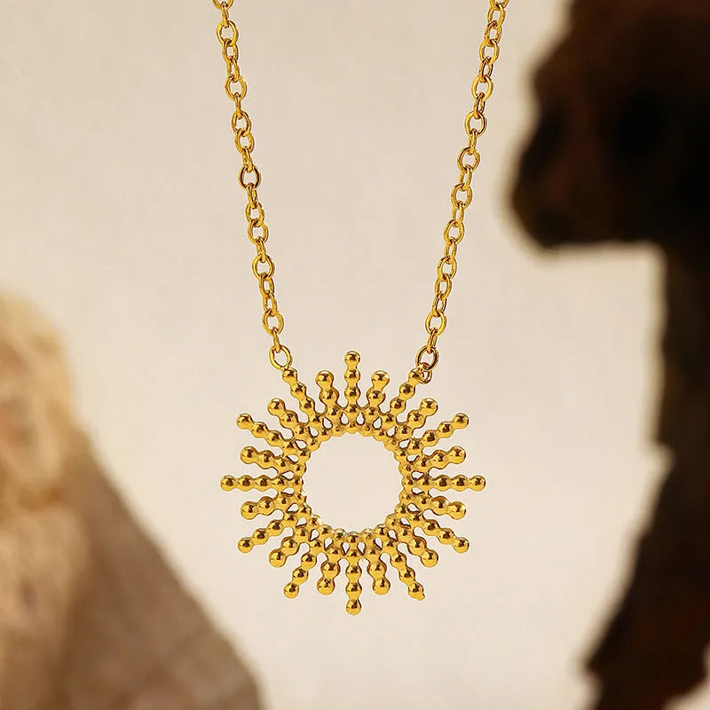 Gold sunflower necklace and bracelet set for women with geometric design