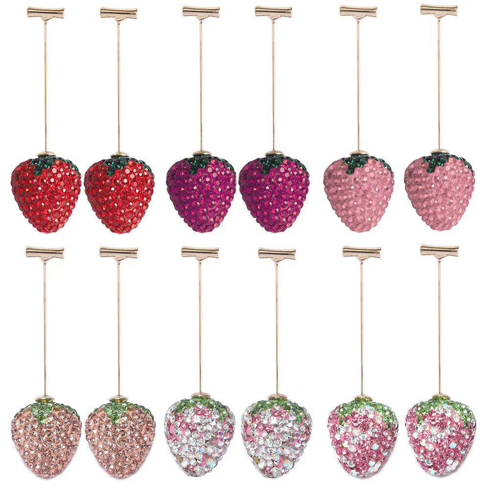 Geometric strawberry design earrings with spot drill detailing in red zinc alloy