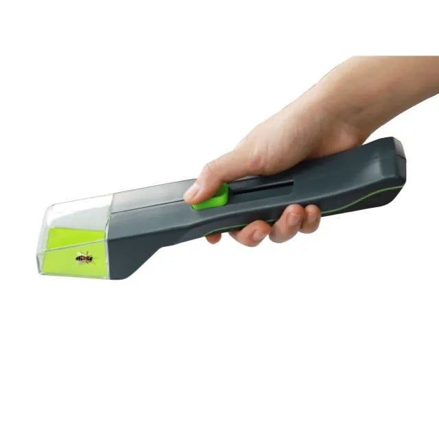 Green plastic handheld insect catcher for garden and grass pest control