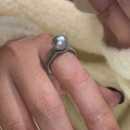 Black pearl geometric open ring with adjustable opening on index finger