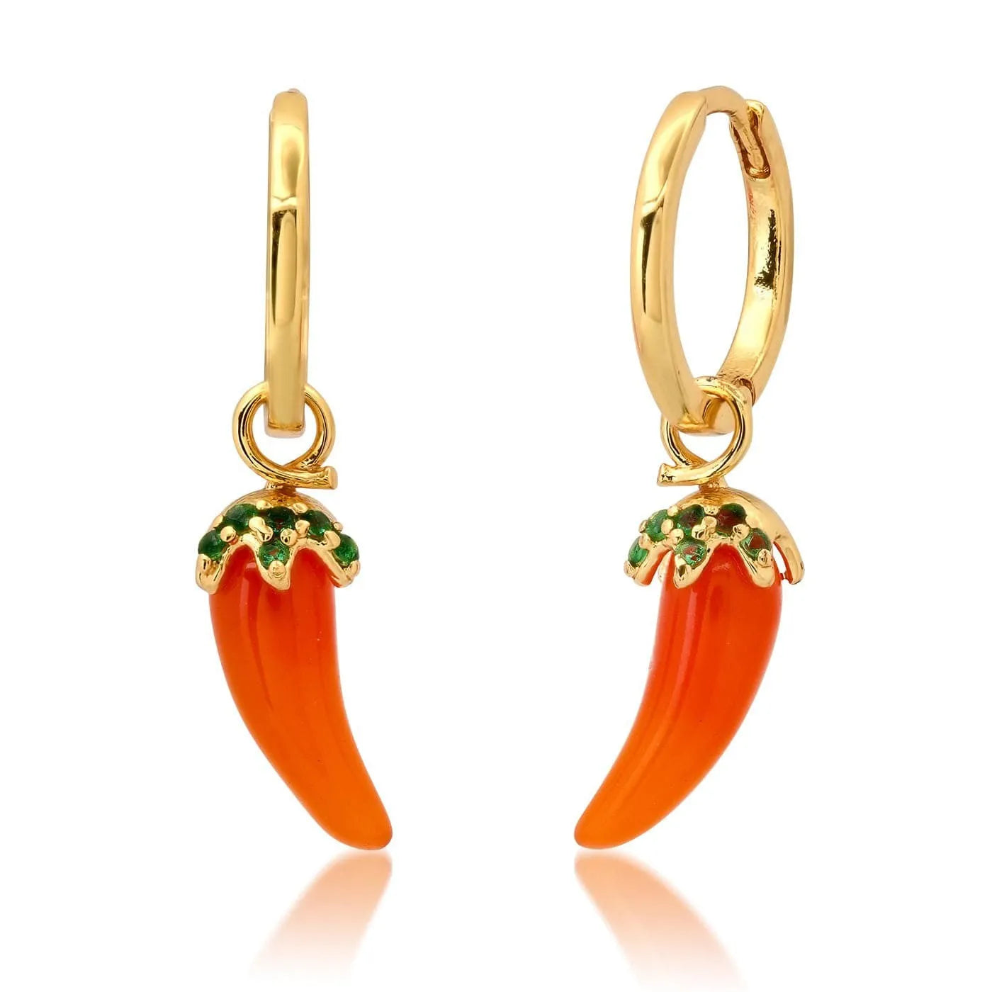Gold plated copper earrings featuring fruit and vegetable shapes in multiple colours on display
