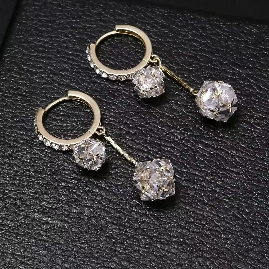Silver copper earrings with tassel ball and rhinestone ball design in drop shape