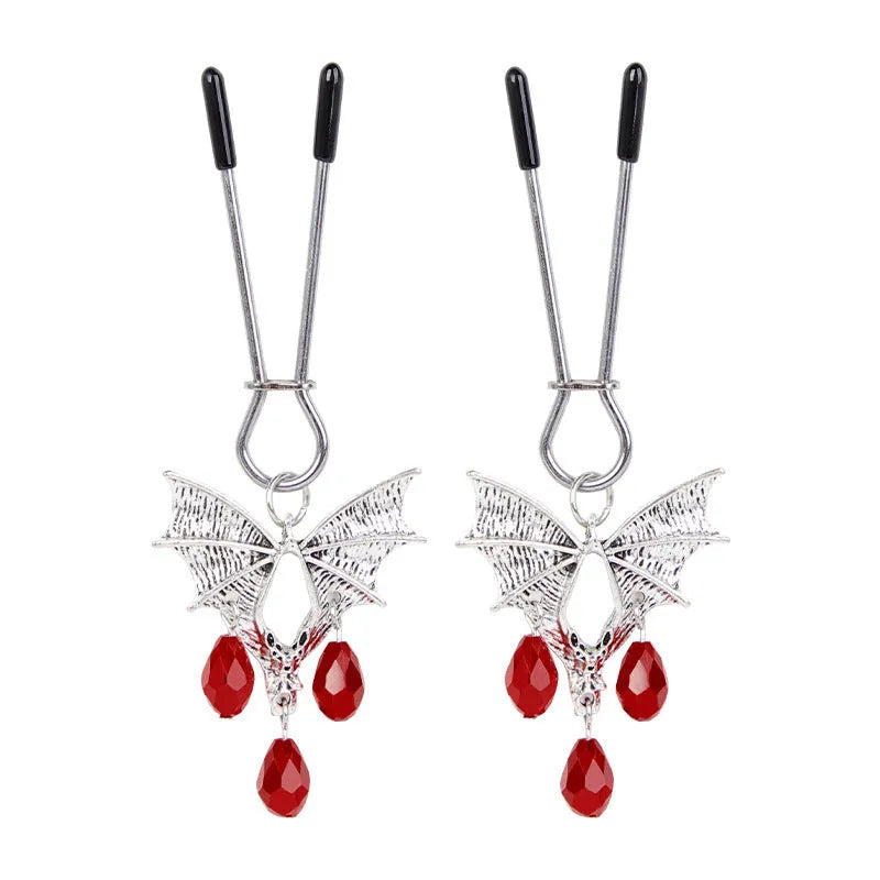 Silver alloy Diamond Bat Nipple Clamp with adjustable screw and ruby bat clip on a white background