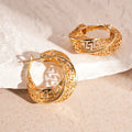 Women's geometric stud earrings with twisted round hollow design in silver or gold electroplated finish