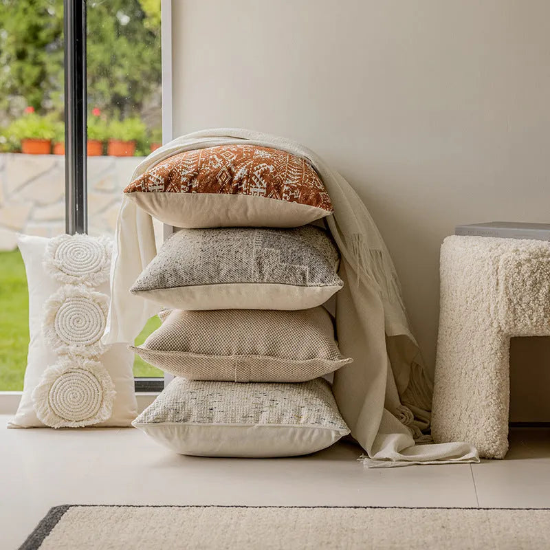 Solid colour sofa cushion pillow on a chair, showing artificial line edge pressing detail.