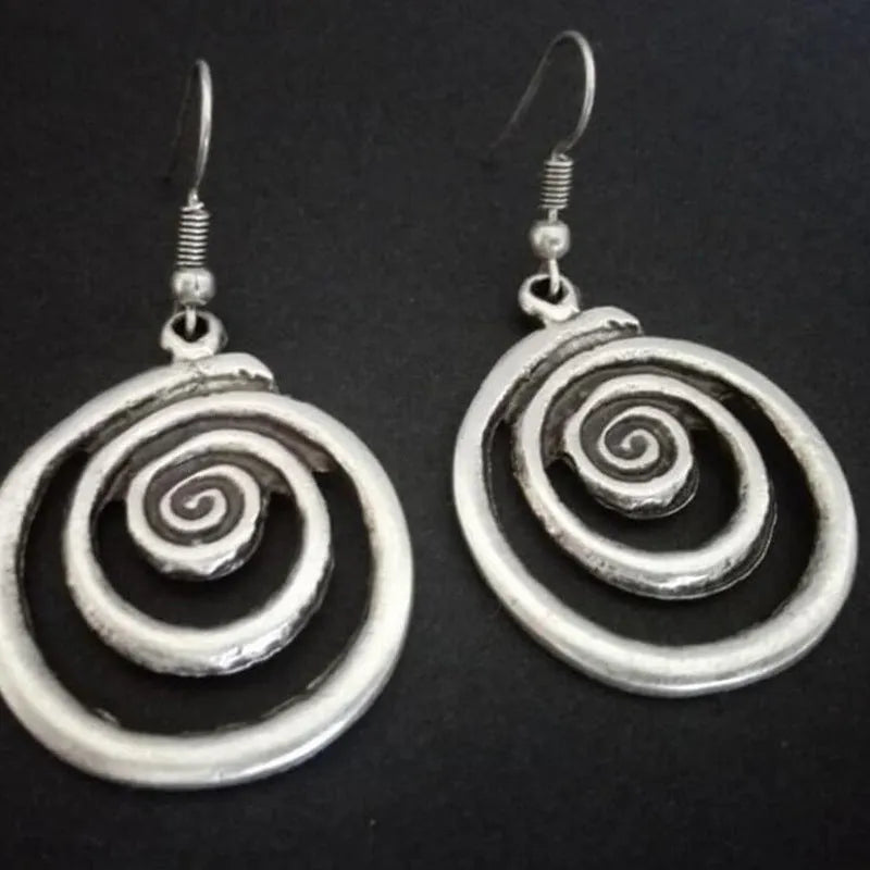 Retro geometric spiral distressed earrings in silver alloy measuring 2.6cm by 5cm