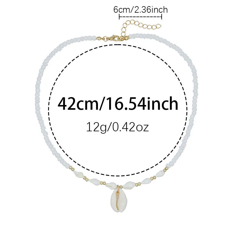White pearl necklace with mother pearl shellfish conch pendant and electroplated finish