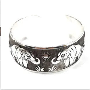 Ethnic carved open Miao silver alloy bracelet in Roman shape with diamond treatment