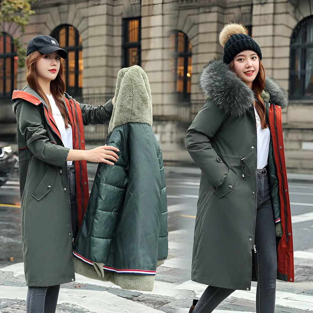 Women's long white padded trench coat with down cotton filler and fleece construction on a hanger.