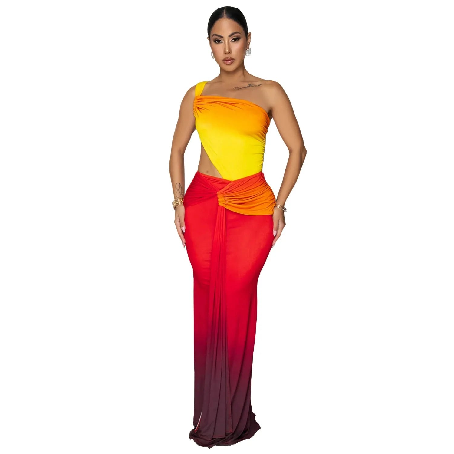 A woman wearing a long gradient colour dress with a cross-shoulder sleeveless design and a high waist.
