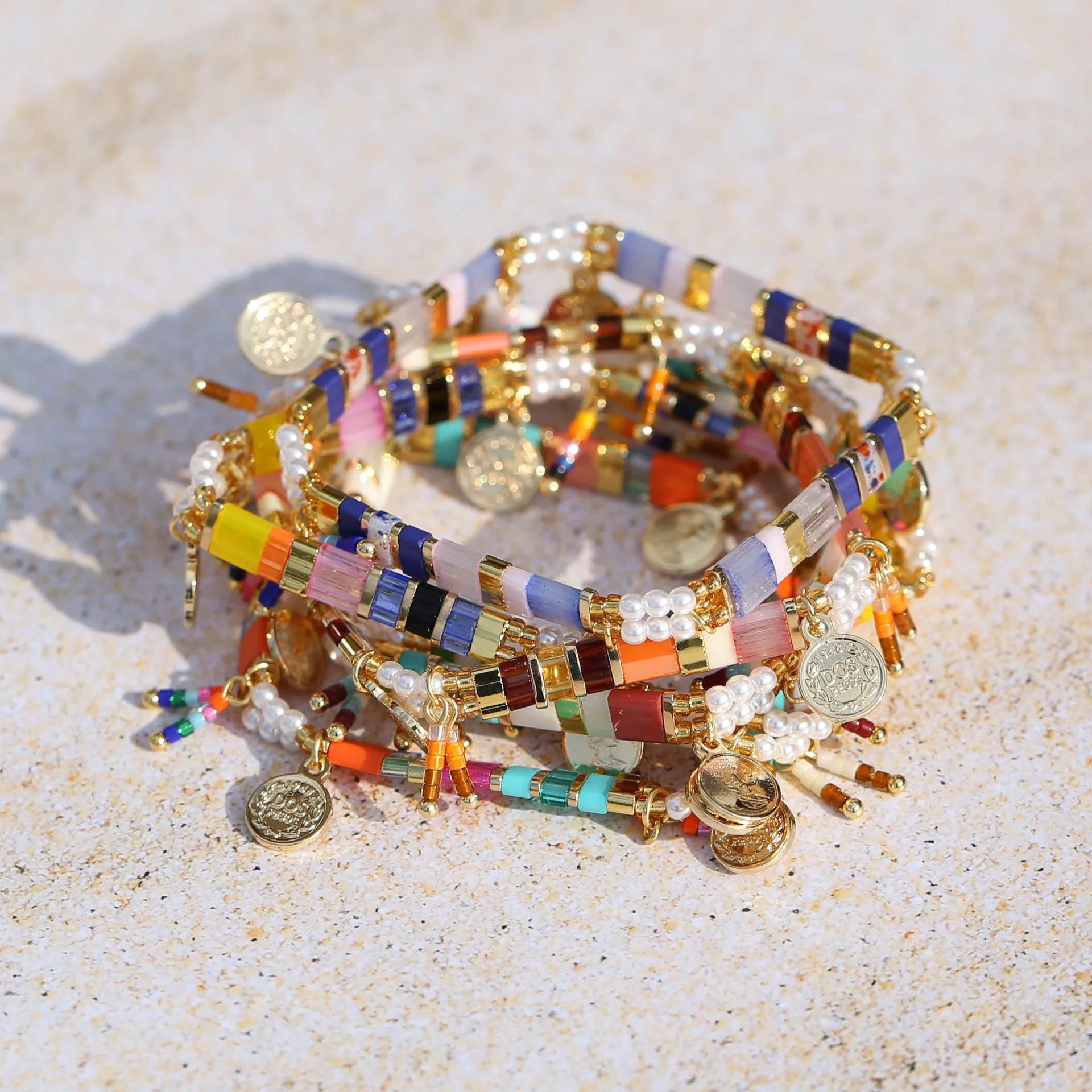 Women's handmade bracelet with imitation pearls and glass coloured beads in six colour options