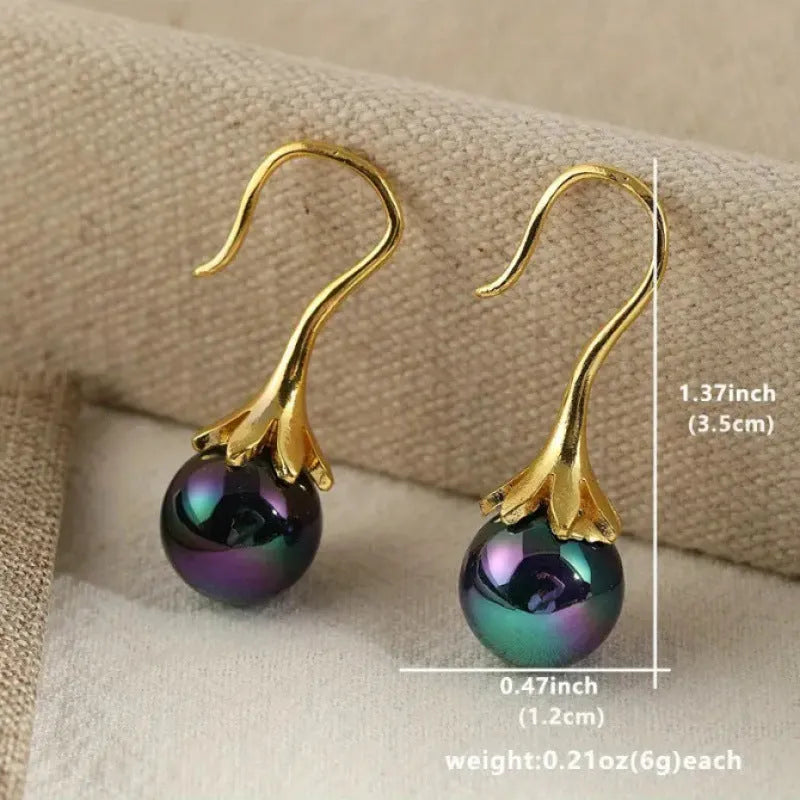 Women's alloy electroplated imitation gold colour retro fashion earrings with personalised creative design