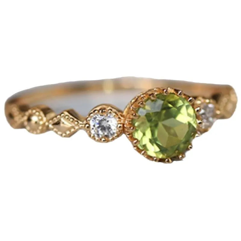 Japanese style copper ring with quadrilateral geometric design and imitation peridot centrepiece
