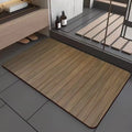Square diatomite bathroom floor mat with wood grain pattern in a bathroom setting.