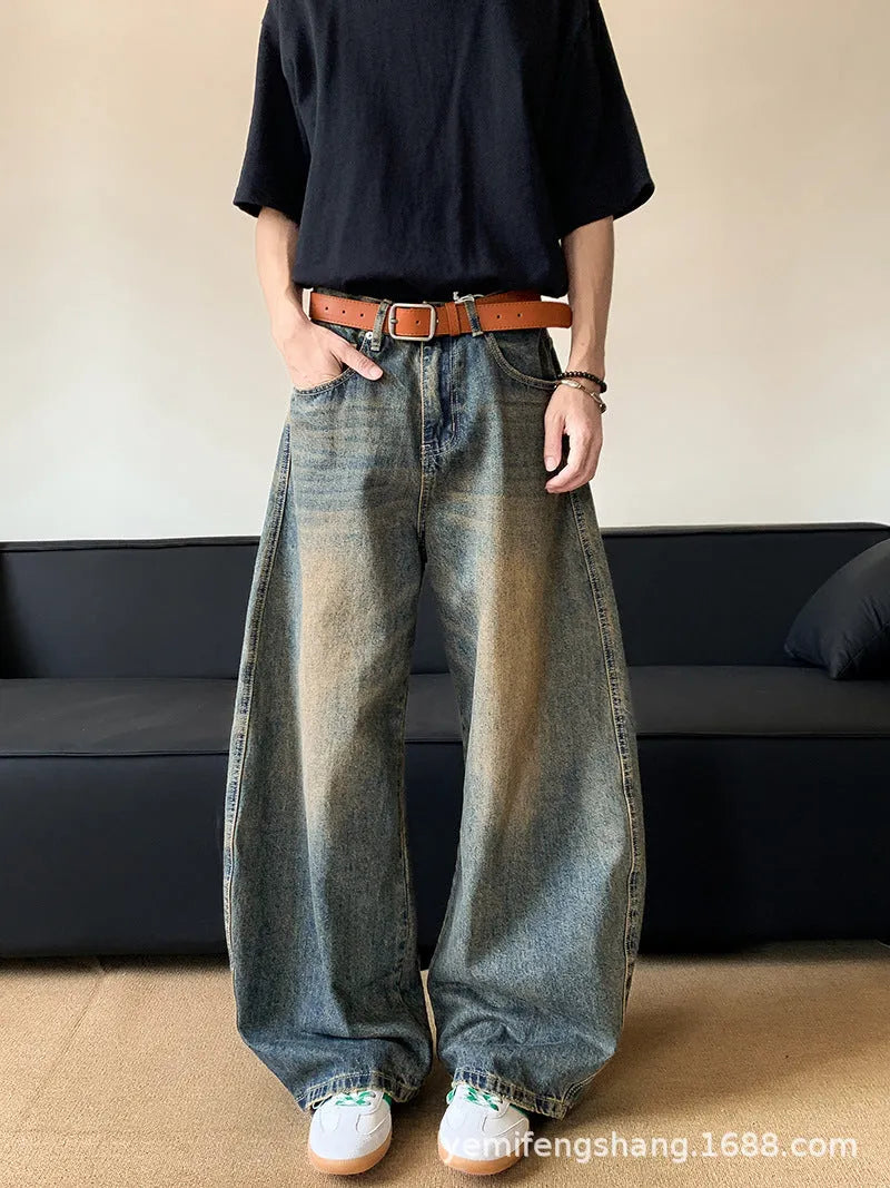 Men's retro blue distressed denim wide-leg pants with vintage styling and slimming silhouette