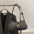 Casual women's handbag with sandwich pocket in black PU leather