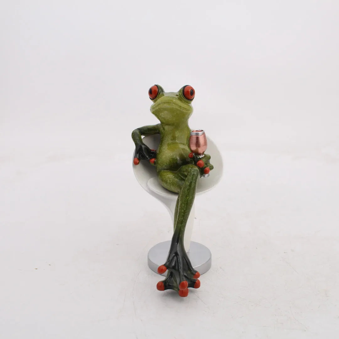 A detailed pastoral-style decorative frog ornament made from beige synthetic resin, approximately 10 cm tall.