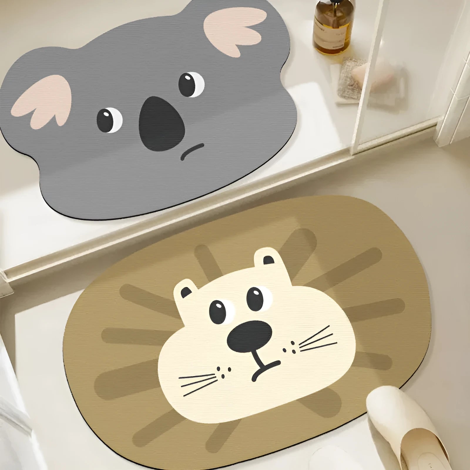 Cartoon animal diatom ooze bathroom mat in sizes 40x60cm, 50x80cm, 60x90cm on a bathroom floor.